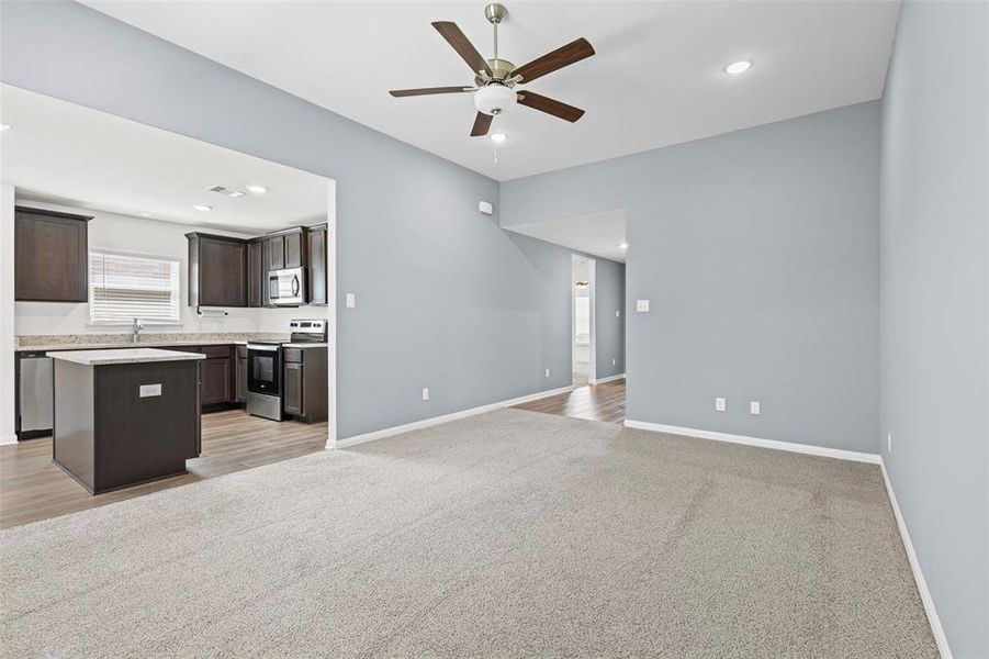 Large living room open to the eat-in kitchen Large living room open to the eat-in kitchen