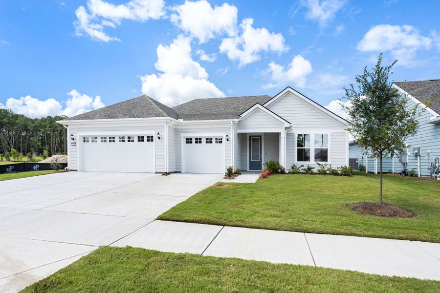 Front exterior of a new home in Del Webb Savannah at Heartwood, Richmond Hill, GA, highlighting curb appeal (Image 25).