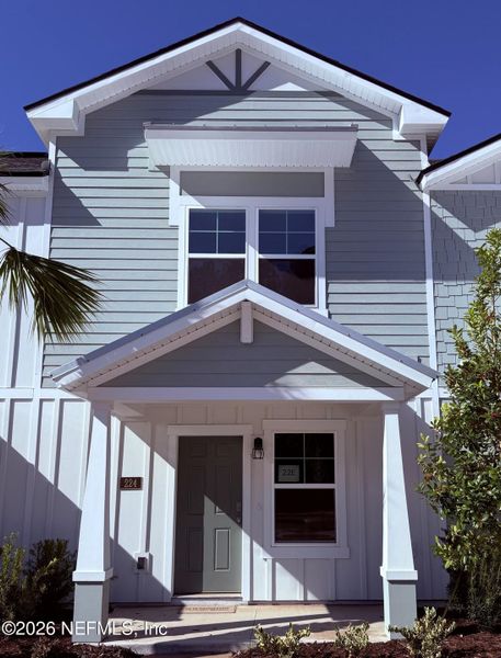 Front exterior of a new home in Liberty Cove, Yulee, FL, highlighting curb appeal (Image 28).