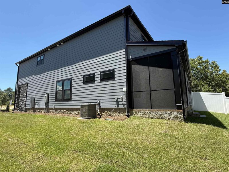 Front exterior of a new home in Dunbar Village, Cayce, SC, highlighting curb appeal (Image 29).