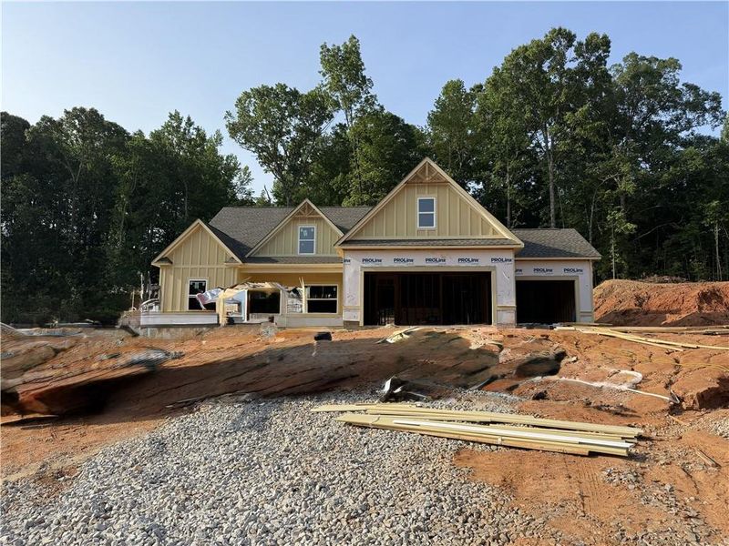 In-progress construction of a new home in Woodland Hills, Loganville, GA (Image 1). In-progress construction of a new home in Woodland Hills, Loganville, GA (Image 1).