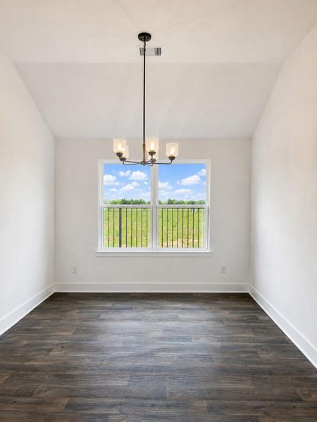 Bright and open dining space with natural light, modern lighting fixtures, and seamless flow into the kitchen and living areas. Bright and open dining space with natural light, modern lighting fixtures, and seamless flow into the kitchen and living areas.