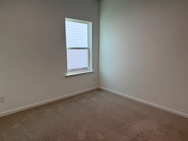 Guest Bed featuring the AW Collection® Serene - Soft tones and space to rest or reconnect.