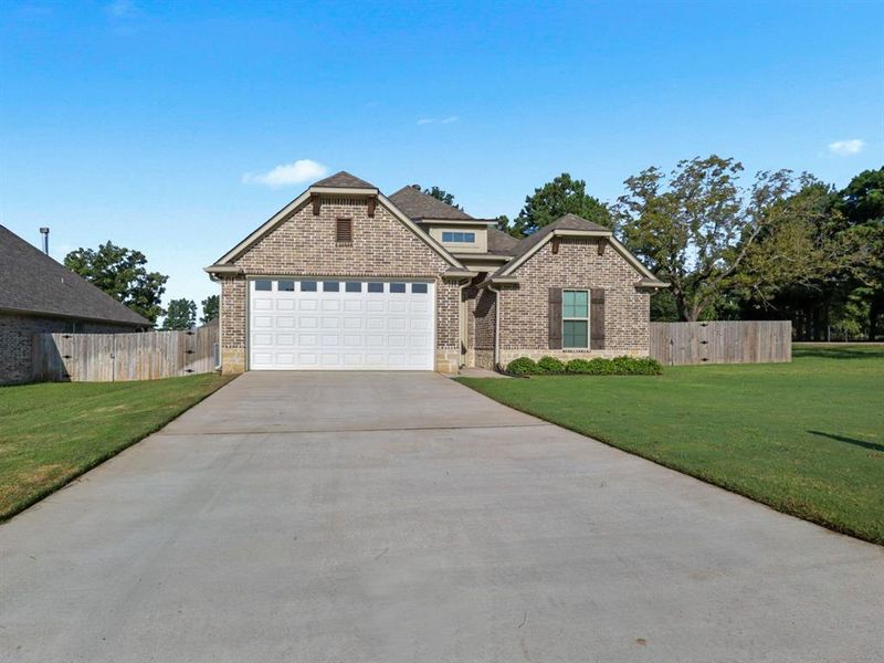 Front exterior of a new home in , Tyler, TX, highlighting curb appeal (Image 11). Front exterior of a new home in , Tyler, TX, highlighting curb appeal (Image 11).