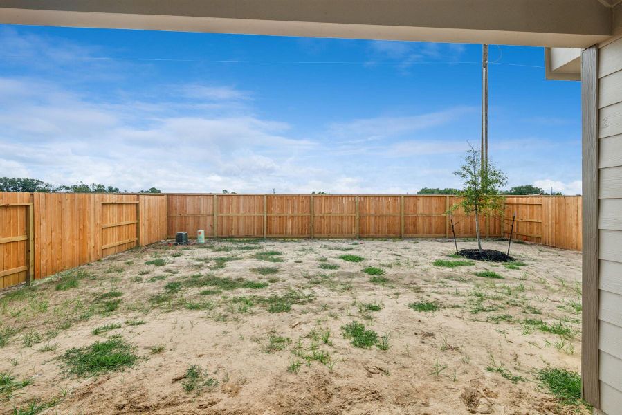 Exterior details and patio area of a home in Harvest Pointe, Needville (Image 4).