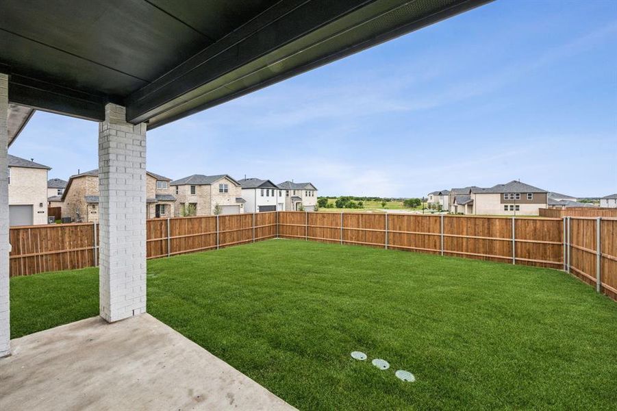 Exterior details and patio area of a home in Bellagio, Forney (Image 3).