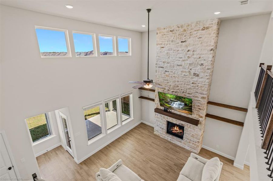 Stunning floor to ceiling stone fireplace to welcome you home