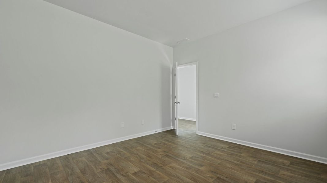 Representative unfurnished interior of a home built from the DOWNING by D.R. Horton in The Oaks at Center Station, Hollywood (Image 12).