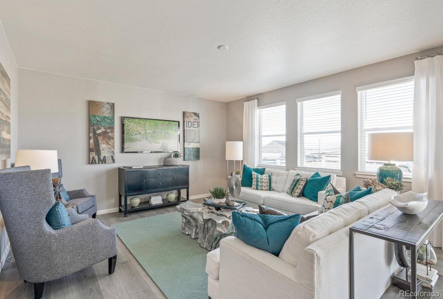 Furnished interior view inside a new home in Trails at Crowfoot, Parker (Image 4).