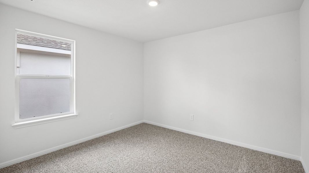 Spacious, unfurnished interior of a new home in Bar W Ranch, Leander (Image 34).