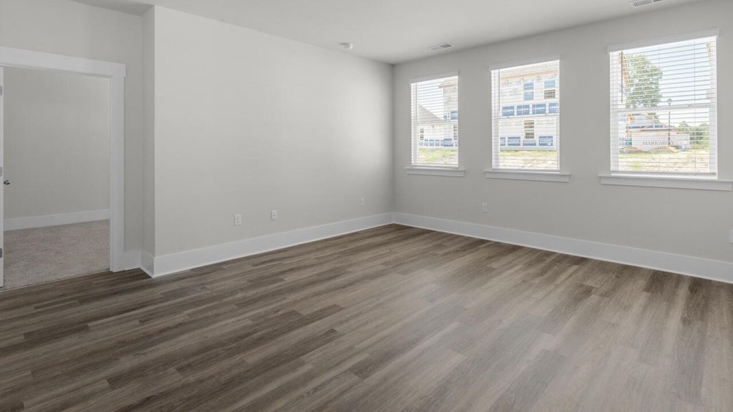 Spacious, unfurnished interior of a new home in Surfside Landing, Hubert (Image 13).