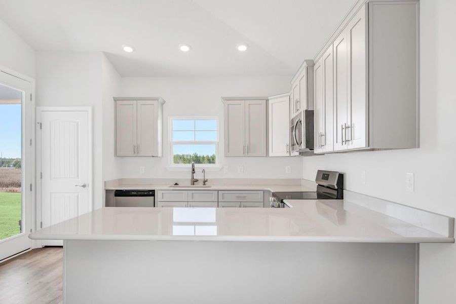 Furnished interior view inside a new home in The Bluffs at Lafayette, Freeport (Image 6).