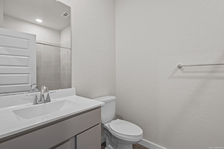 Furnished interior view inside a new home in Spring Creek, San Antonio (Image 9).