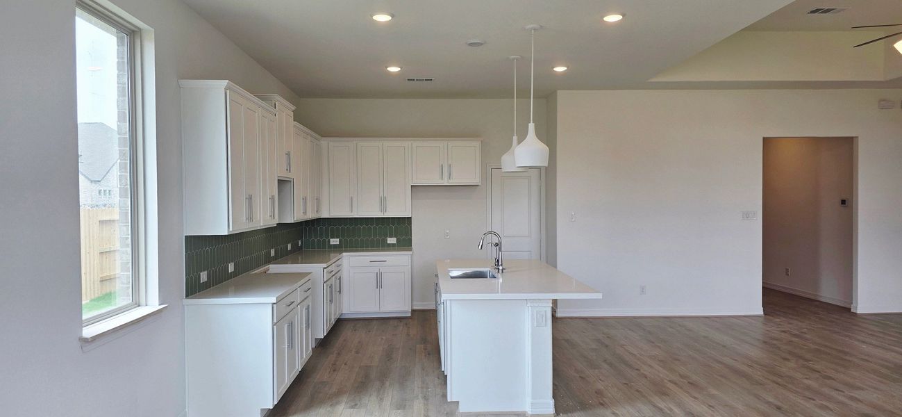 Furnished interior view inside a new home in Sunterra Lakes, Brookshire (Image 4).