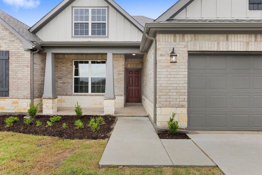 Front exterior of a new home in Waverly Estates, Nevada, TX, highlighting curb appeal (Image 44).