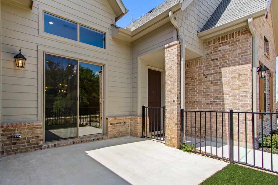 Exterior details and patio area of a home in Cottonwood Creek, Rowlett (Image 26).