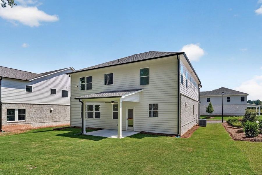 Exterior details and patio area of a home in Nichols Farm, Dacula (Image 26).