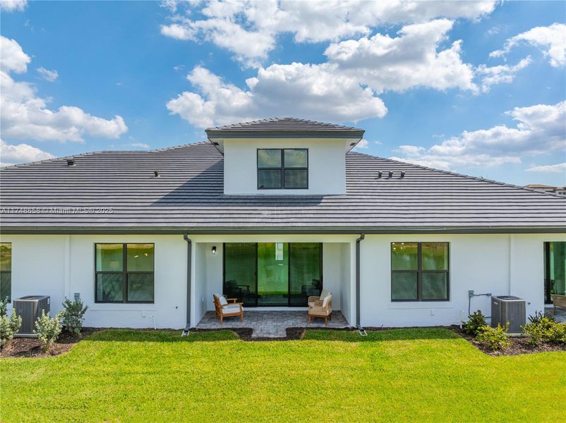 Front exterior of a new home in , Fort Myers, FL, highlighting curb appeal (Image 1).