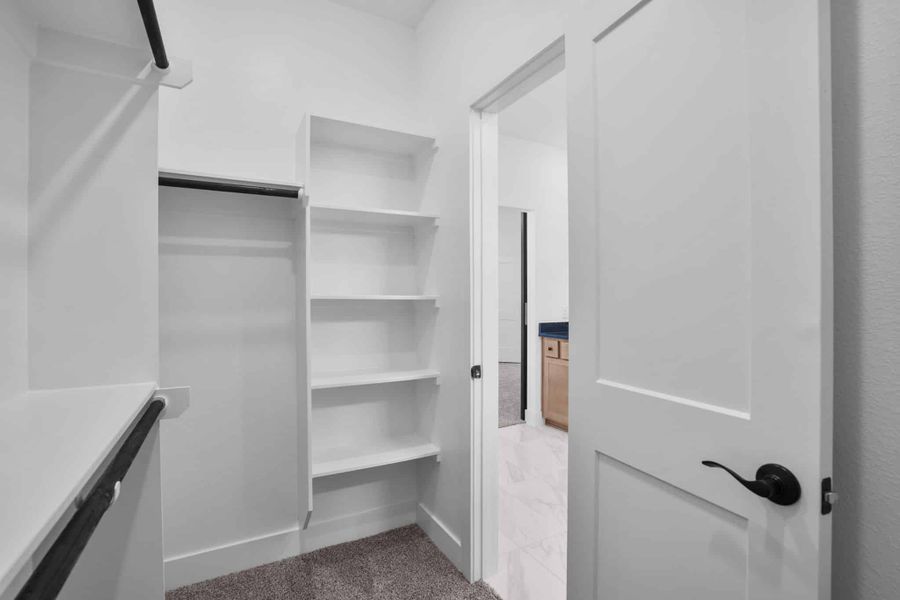 Furnished interior view inside a new home in Meridiana, Manvel (Image 12).