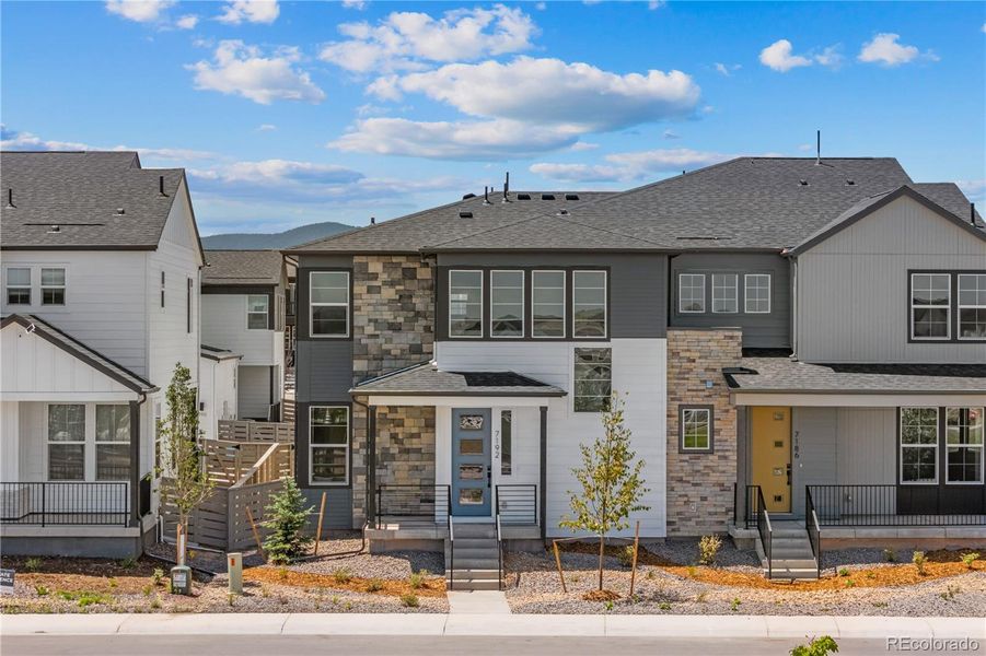 Front exterior of a new home in Duet at Sterling Ranch, Littleton, CO, highlighting curb appeal (Image 20).