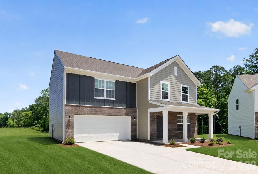 Front exterior of a new home in Creekside Cottages, Bessemer City, NC, highlighting curb appeal (Image 18).