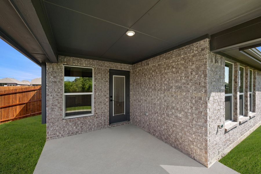 Exterior details and patio area of a home in Hunters Ridge, Crowley (Image 3). Exterior details and patio area of a home in Hunters Ridge, Crowley (Image 3).