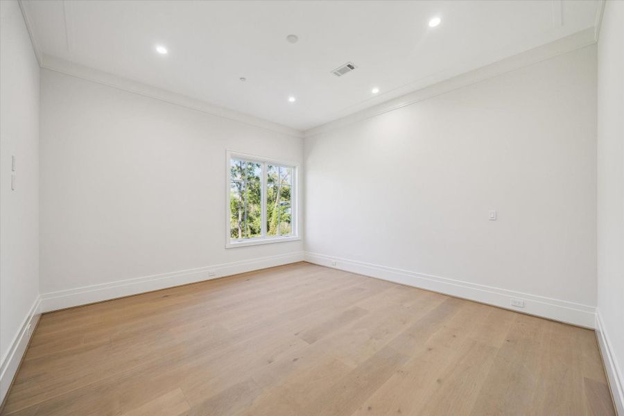 Bedroom #5 on the second floor. Has an n-suite bath with shower/tub combo and a walk-in closet with custom built-ins.