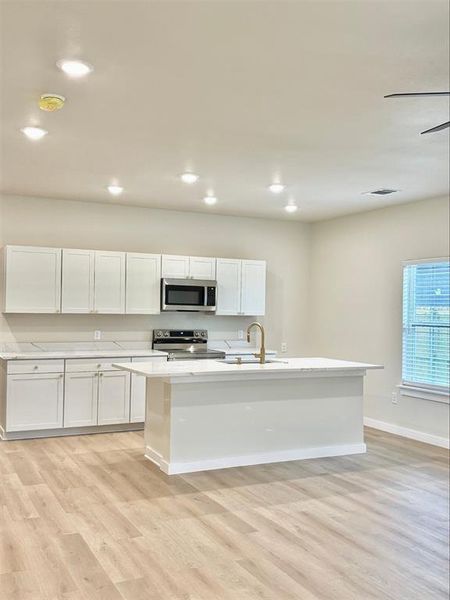 Furnished interior view inside a new home in , Denison (Image 9).