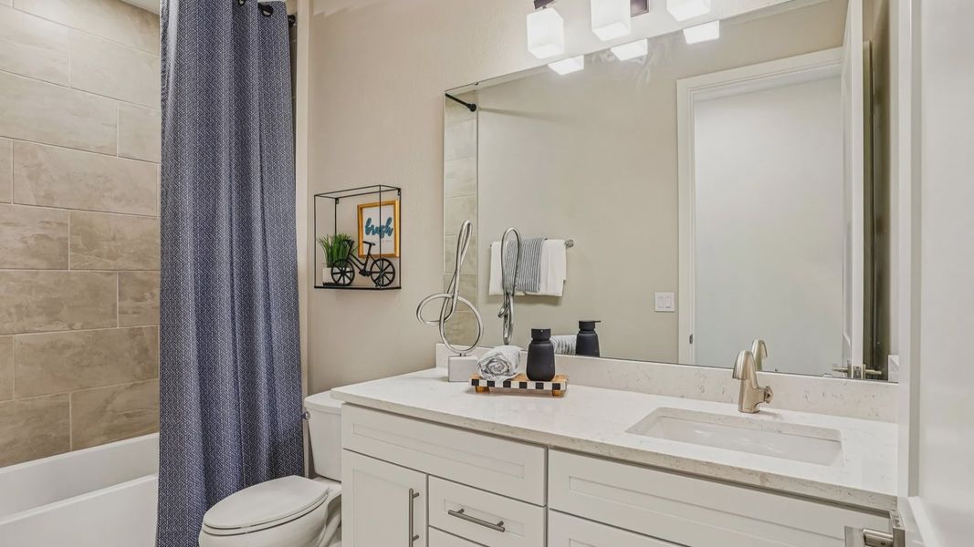Oleander First Floor Secondary Bathroom by DRB Homes in Ardisia Park in New Smyrna Beach, FL