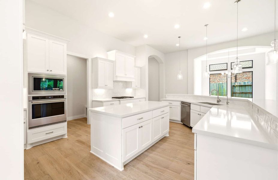 Furnished interior view inside a new home in The Woodlands Hills 65′, Willis (Image 14).