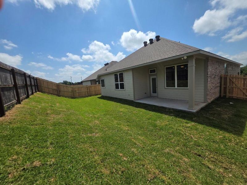 Exterior details and patio area of a home in , Brenham (Image 3).