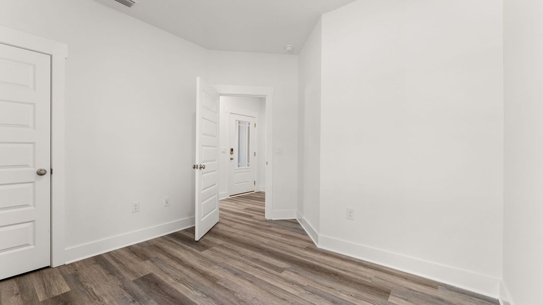 Representative unfurnished interior of a home built from the Kennedy by D.R. Horton in Holley Grove at Peach Creek, Santa Rosa Beach (Image 26). Representative unfurnished interior of a home built from the Kennedy by D.R. Horton in Holley Grove at Peach Creek, Santa Rosa Beach (Image 26).