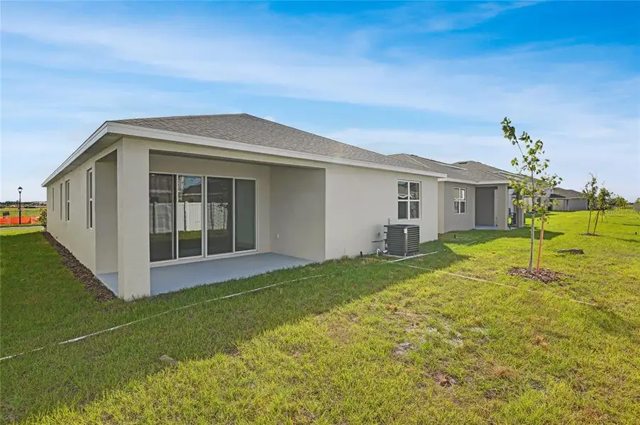Exterior details and patio area of a home in , Winter Haven (Image 4). Exterior details and patio area of a home in , Winter Haven (Image 4).
