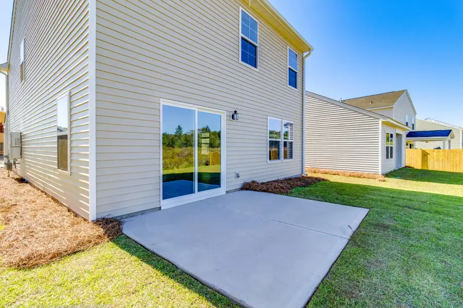 Exterior details and patio area of a home in Laurinton Farms, Hopkins (Image 3).