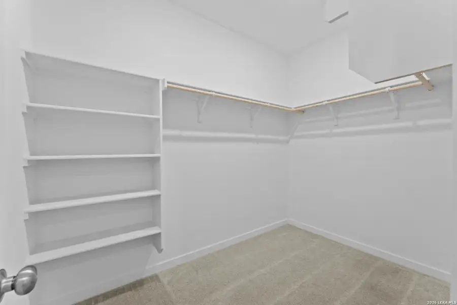 Spacious, unfurnished interior of a new home in Brookmill, San Antonio (Image 12).