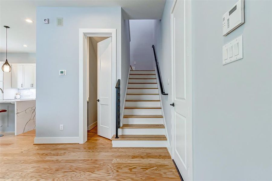 View towards the stairs. Notice the beautiful handcrafted metal railing.