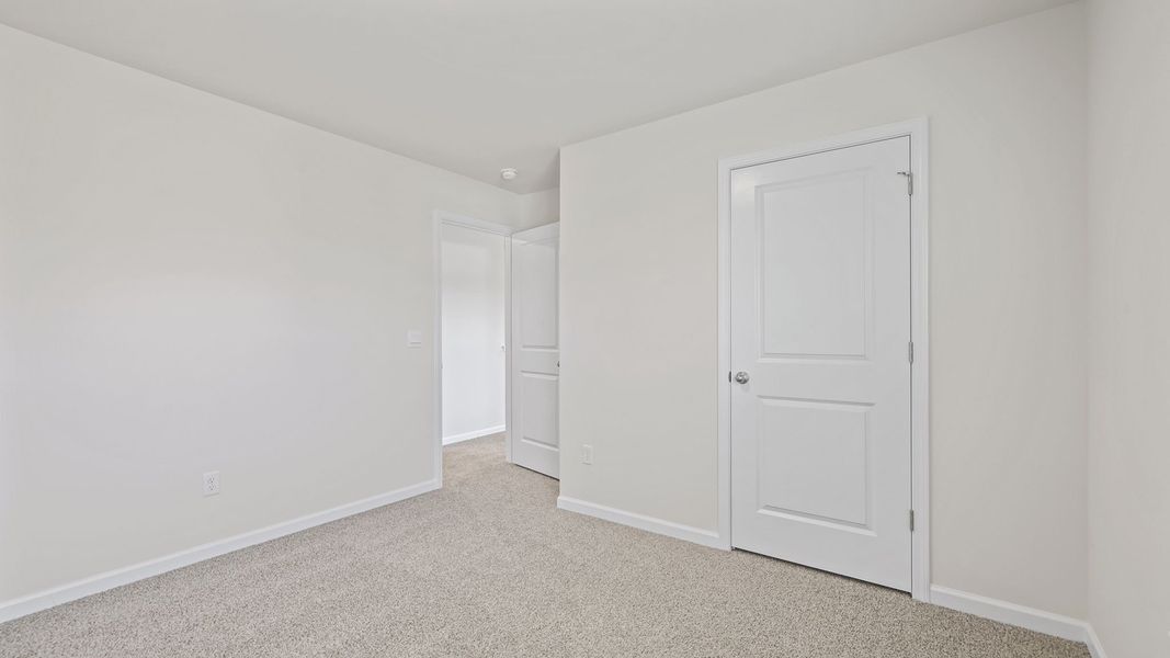 Spacious, unfurnished interior of a new home in Bentley Park, Greenwood (Image 25). Spacious, unfurnished interior of a new home in Bentley Park, Greenwood (Image 25).