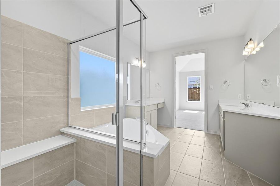 Bathroom with vanity, a bath, and a shower stall Bathroom with vanity, a bath, and a shower stall