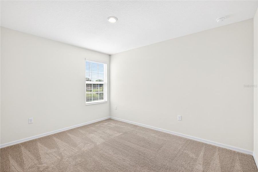 Spacious, unfurnished interior of a new home in Tula Parc, Astatula (Image 33).