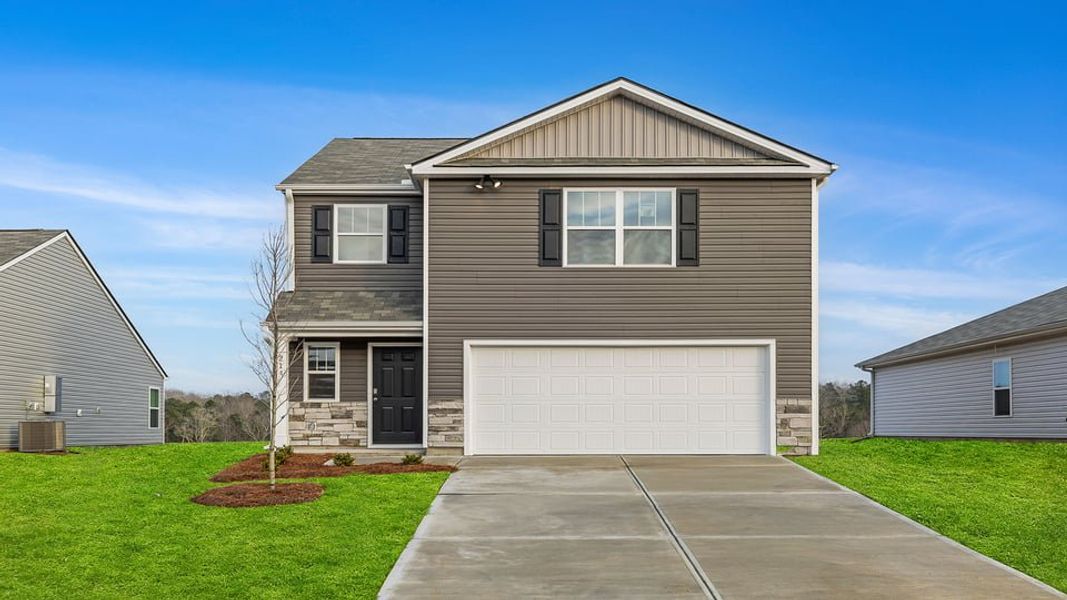 Front exterior of a new home in Gibson Grove, Laurens, SC, highlighting curb appeal (Image 1). Front exterior of a new home in Gibson Grove, Laurens, SC, highlighting curb appeal (Image 1).