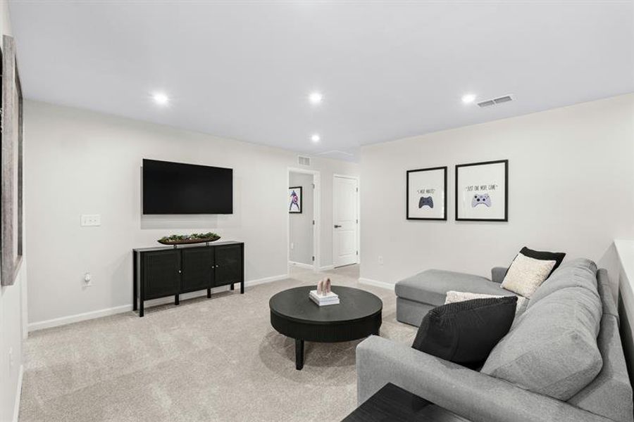 Representative furnished interior of a home built from the Woodford by Ryan Homes in Oakwood Trace, Fairburn (Image 21).