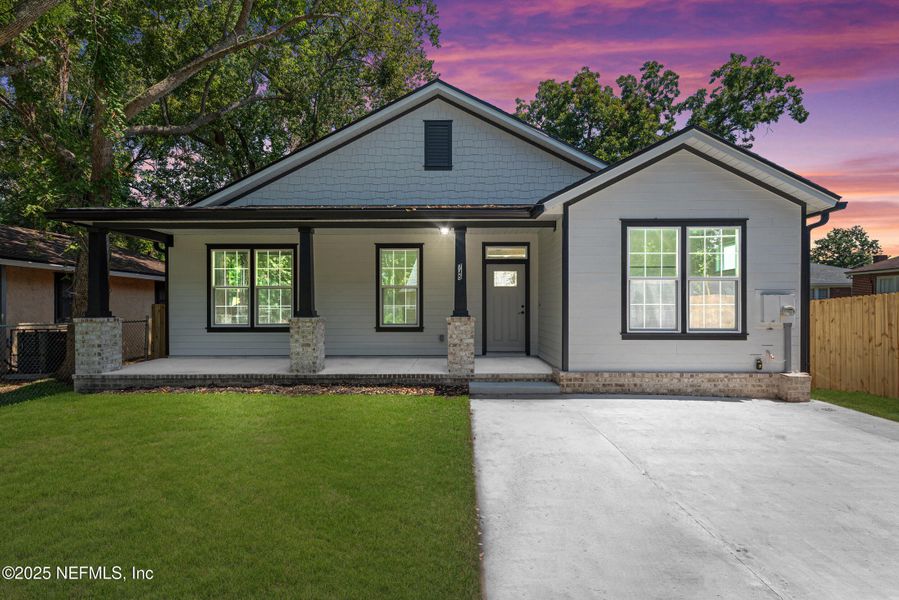 Front exterior of a new home in , Jacksonville, FL, highlighting curb appeal (Image 18).