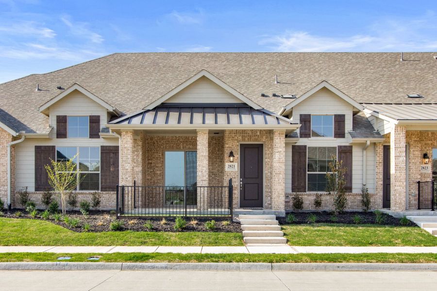 Front exterior of a new home in Woodbridge Villas, Wylie, TX, highlighting curb appeal (Image 1). Front exterior of a new home in Woodbridge Villas, Wylie, TX, highlighting curb appeal (Image 1).