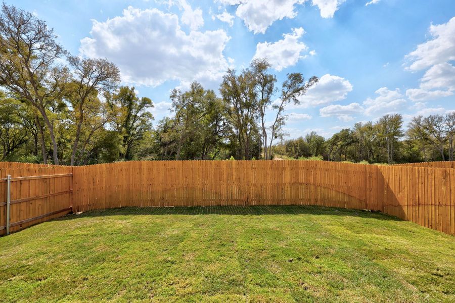 Exterior details and patio area of a home in Trinity Ranch, Elgin (Image 20).