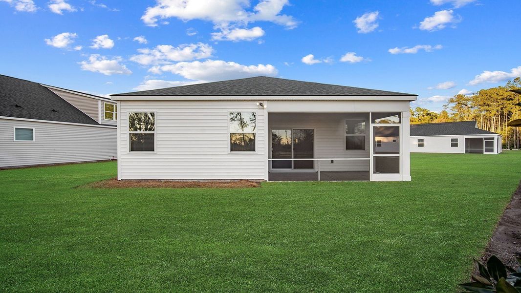 Exterior details and patio area of a home in The Lakes at North Glynn, Brunswick (Image 3).