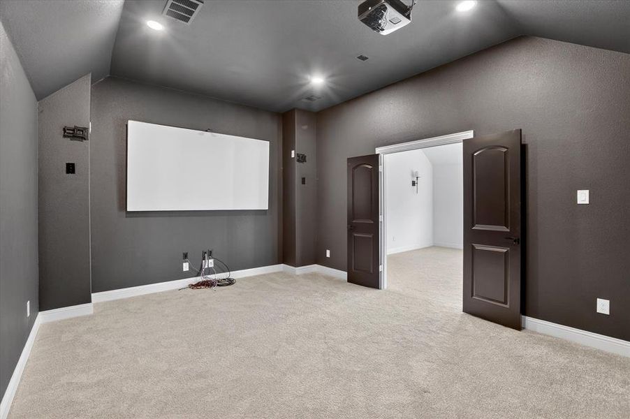 Media room with screen & Projector. Upstairs