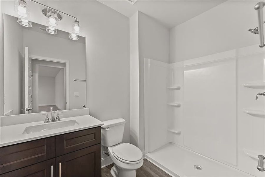 Furnished interior view inside a new home in Magnolia Villas, Cornelia (Image 10).