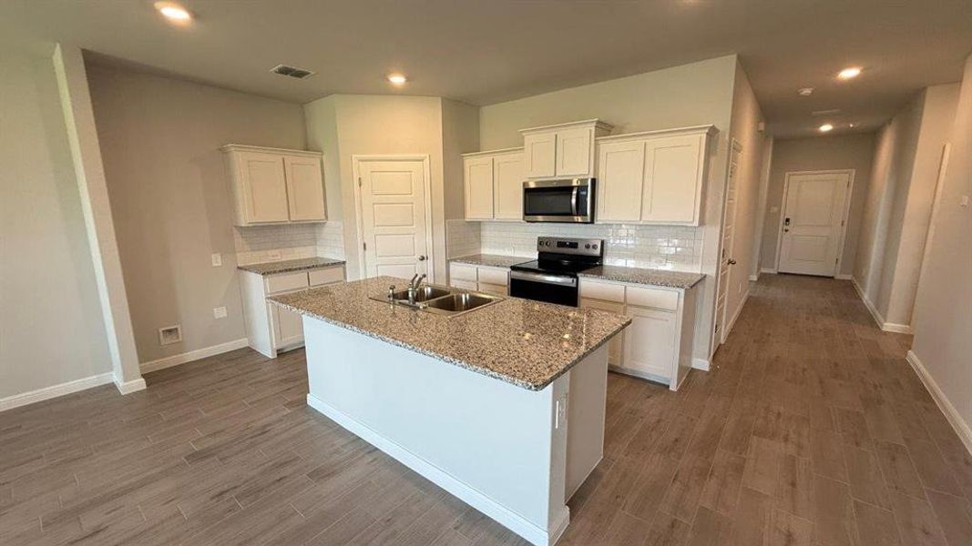 Kitchen - All Home and community information, including pricing, included features, terms, availability and amenities, are subject to change at any time without notice or obligation. All Drawings, pictures, photographs, video, square footages, floor plans, elevations, features, colors and sizes are approximate for illustration purposes only and will vary from the homes as built. Kitchen - All Home and community information, including pricing, included features, terms, availability and amenities, are subject to change at any time without notice or obligation. All Drawings, pictures, photographs, video, square footages, floor plans, elevations, features, colors and sizes are approximate for illustration purposes only and will vary from the homes as built.