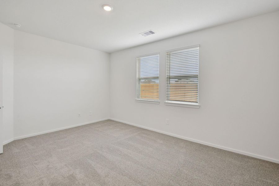 Spacious, unfurnished interior of a new home in Sanford Farms - Traditional Series, Waller (Image 33).