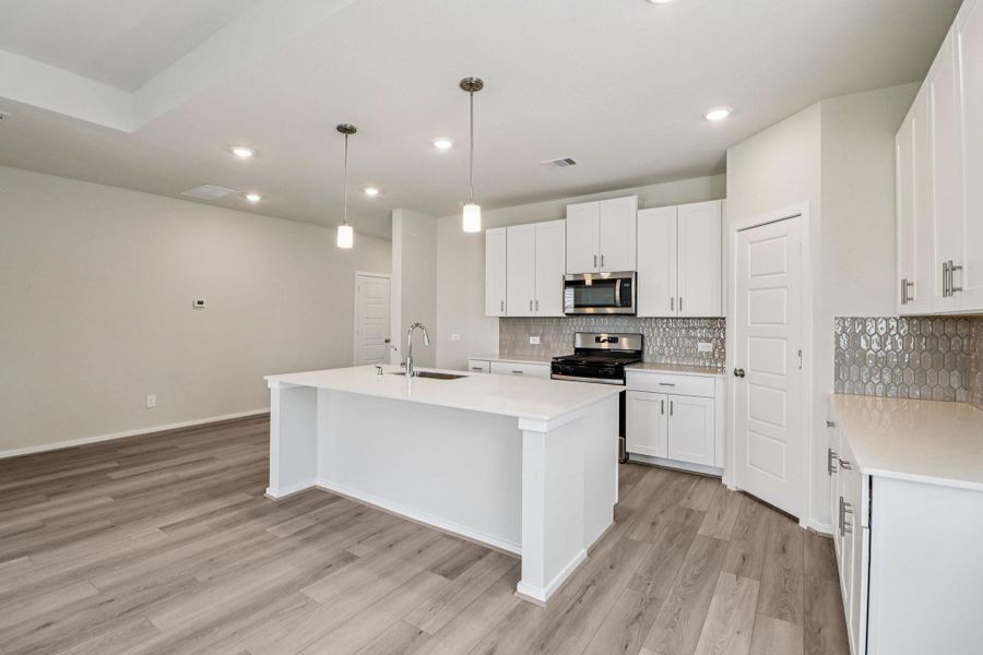 Furnished interior view inside a new home in Pine Lake Cove - Premier Series, Montgomery (Image 4).
